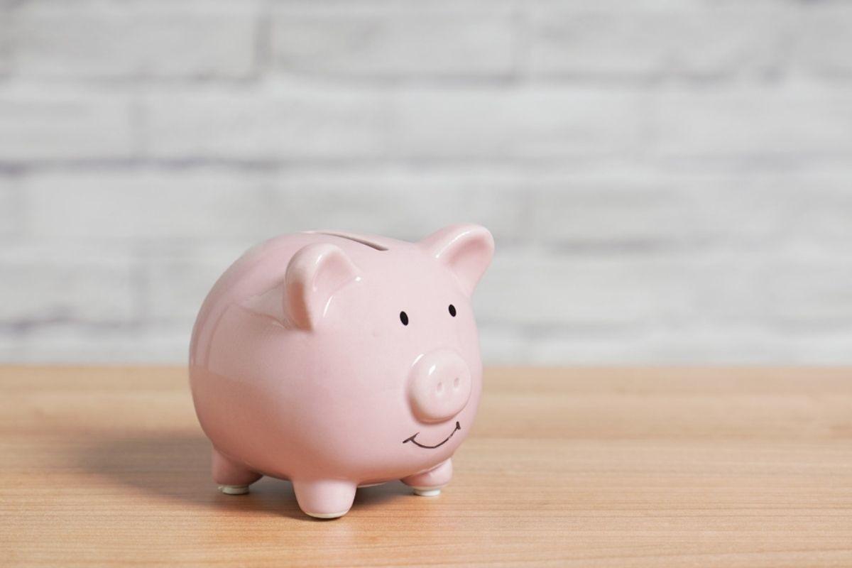 Piggy Bank on Table with Copy Space