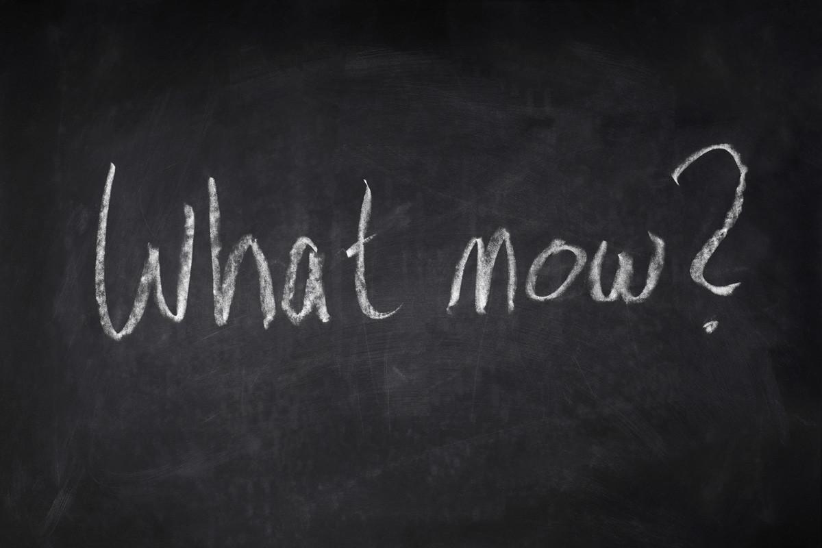 What Now - Handwritten Question on Chalkboard