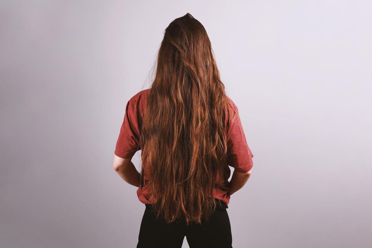 Brunette Woman with Very Long Hair Down to Her Butt