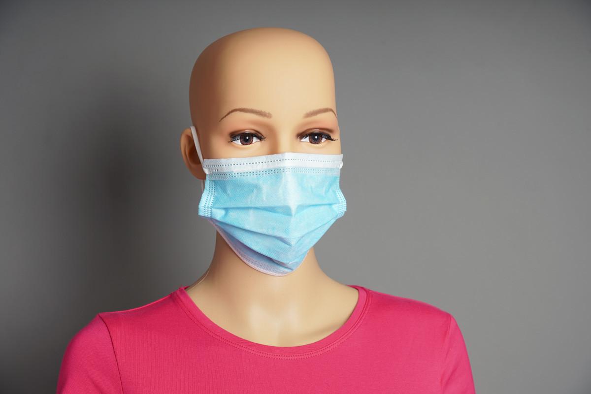 Shop Window Mannequin Wearing Medical Face Mask