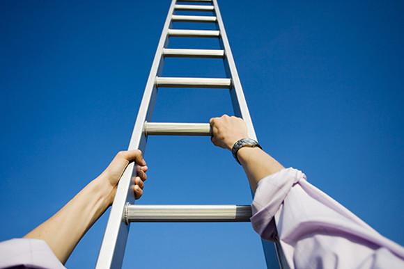 A Man Climbing a Ladder