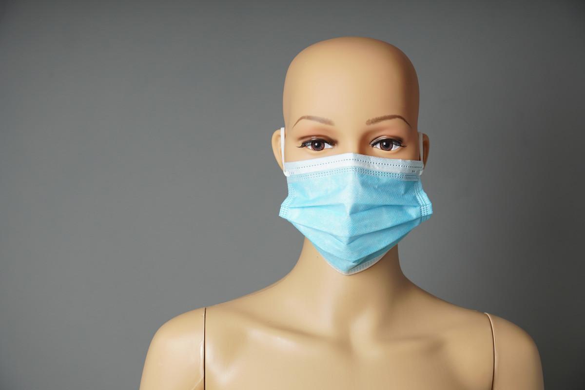 Shop Window Mannequin Wearing Medical Face Mask
