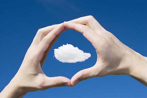 A Man Framing a Cloud in His Hands