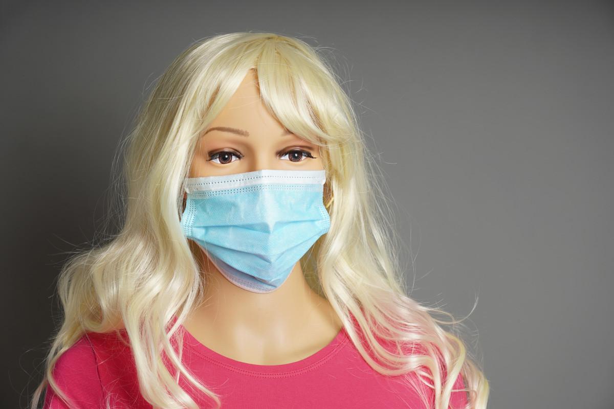 Shop Window Mannequin Wearing Protective Face Mask