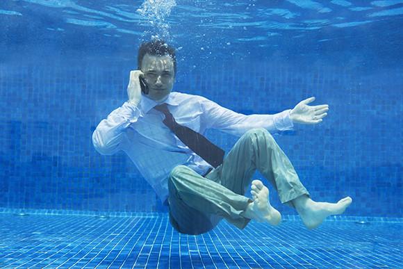 A Businessman Underwater