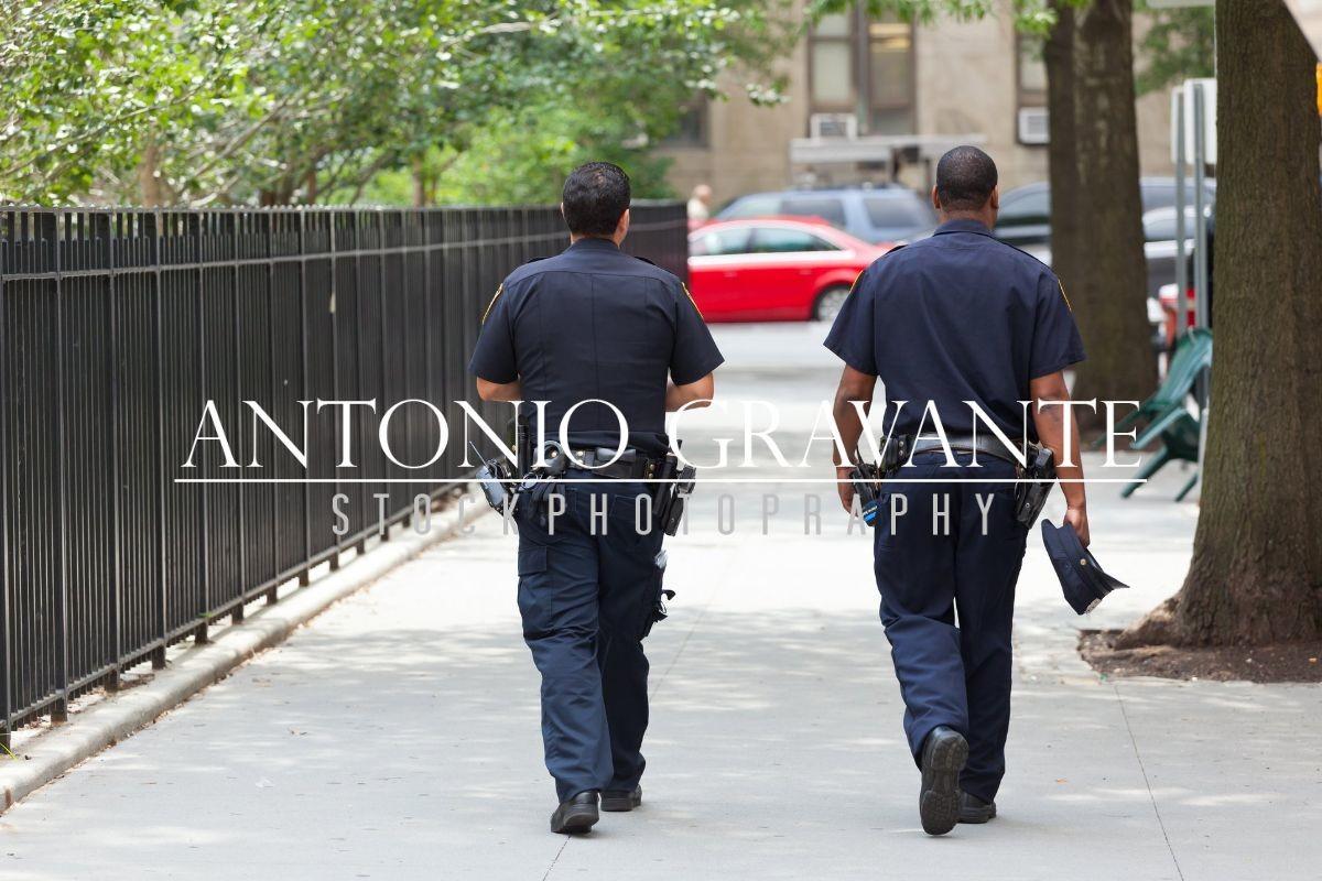 Two Police Officers from the Back in the Center of Manhattan
