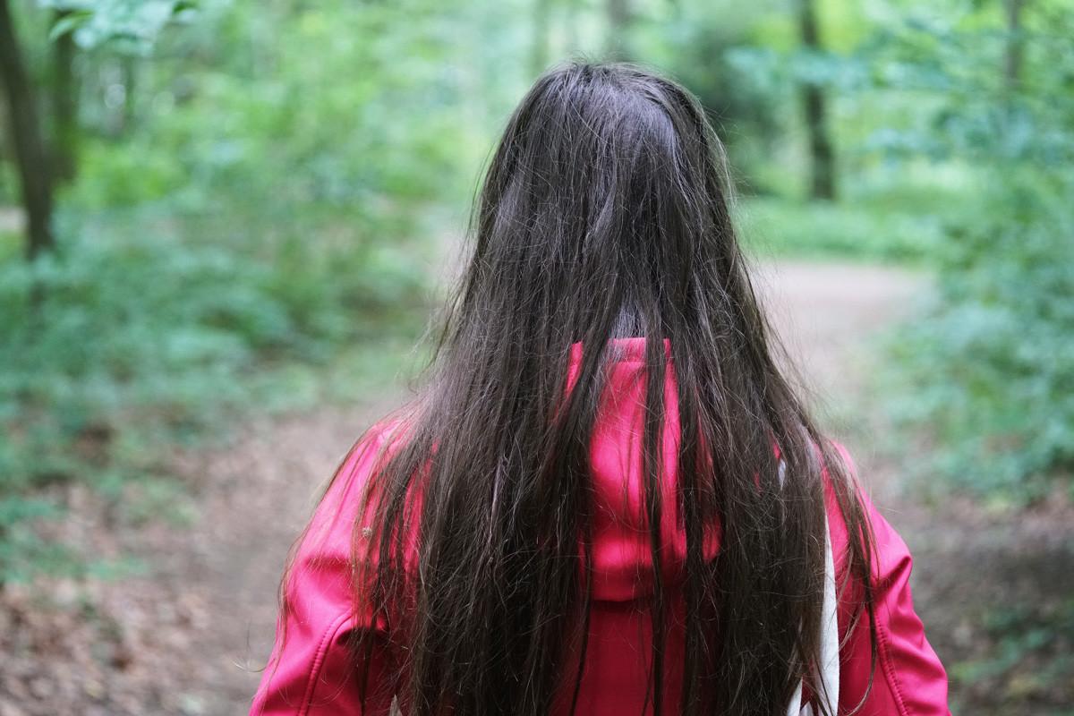 Rearview of Unrecognizable Young Woman