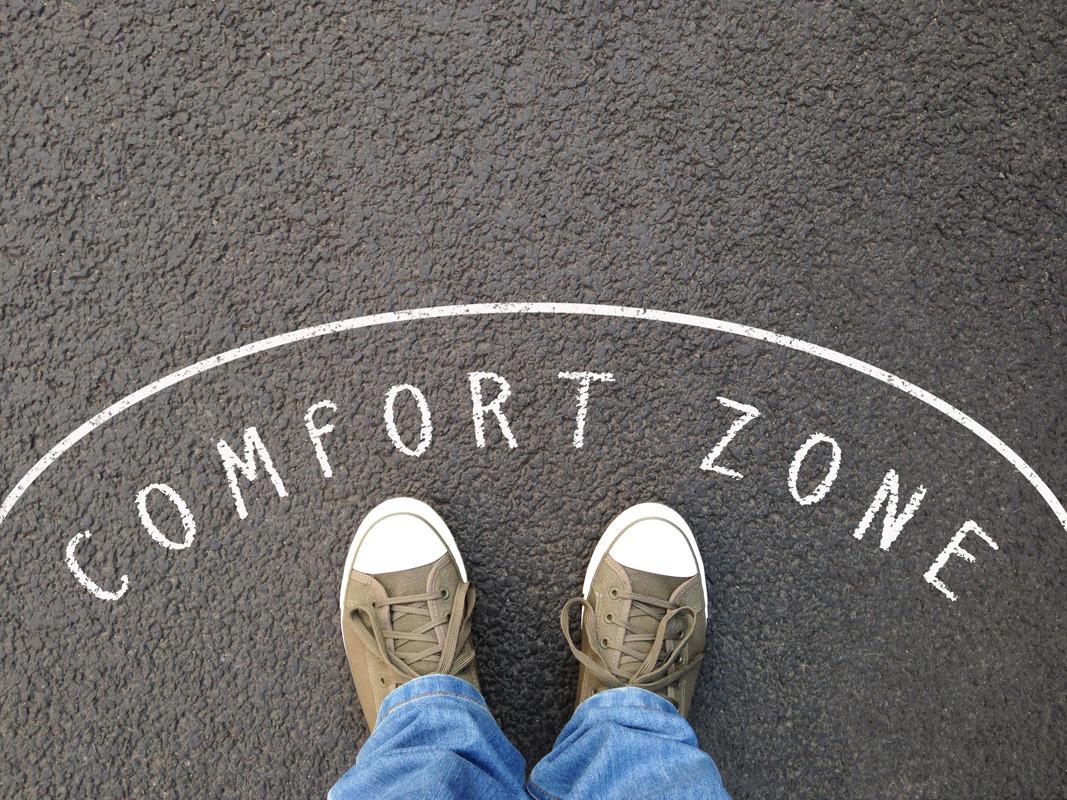 Feet in Canvas Shoes Standing Inside Comfort Zone